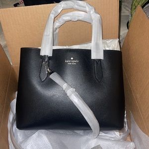 Brand new Kate Spade satchel purse. Bought a couple months ago and have not used